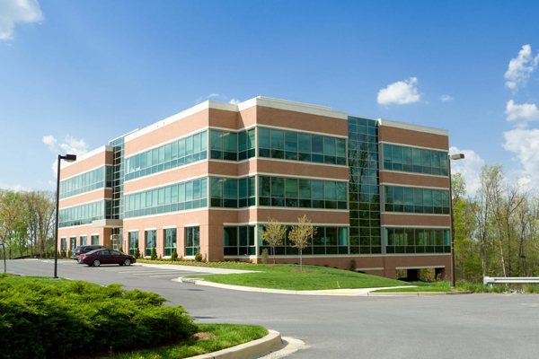 A building with many windows serviced by ELEET Pest Elimination